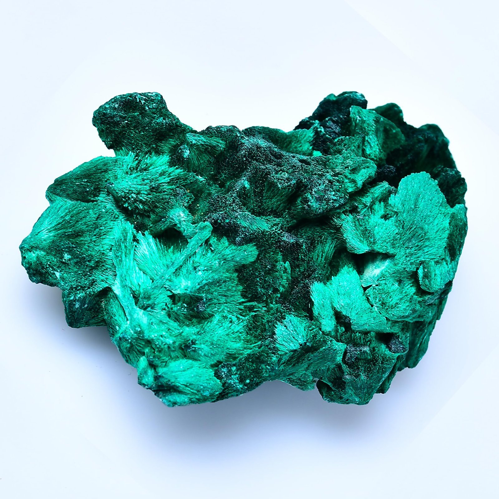 Green malachite mineral specimen with a crystalline, textured surface